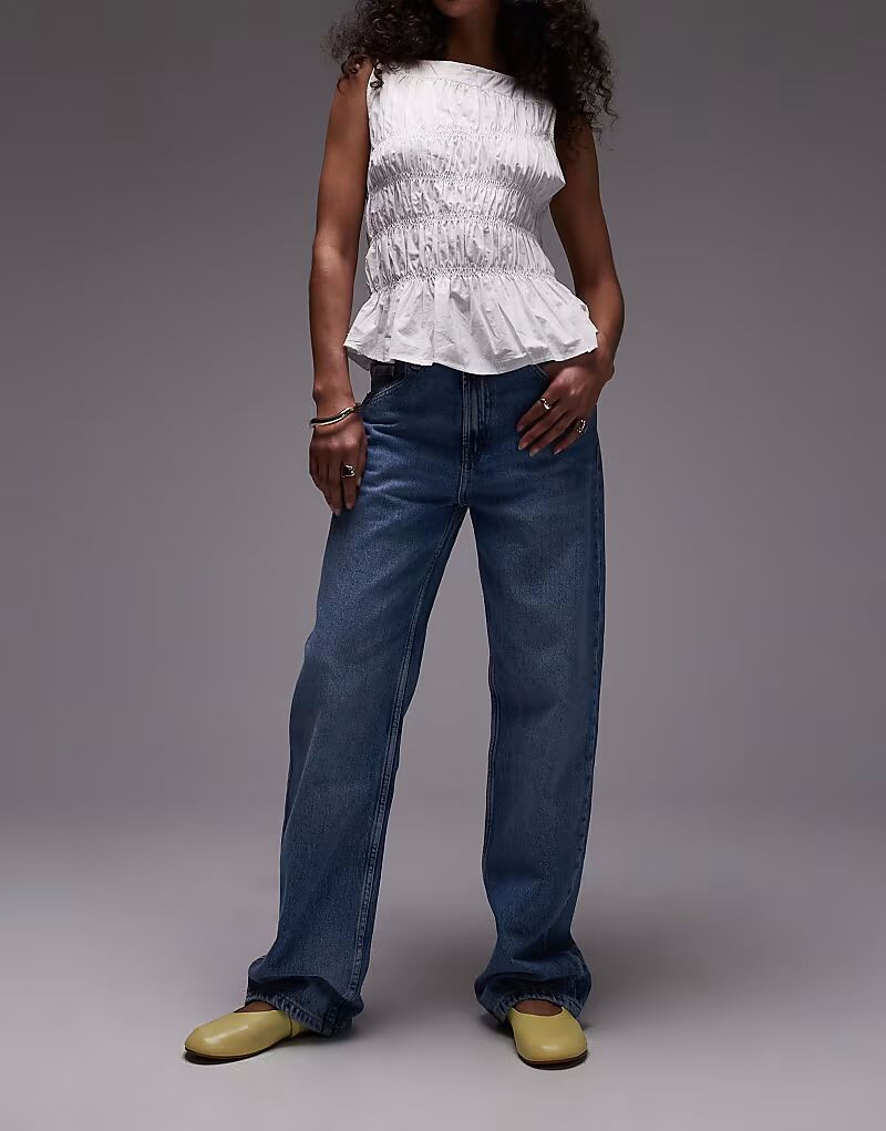 Джинсы свободного кроя Mango Miami прямого кроя светло-голубого цвета 
Джинсы свободного кроя Mango Miami прямого кроя светло-голубого цвета