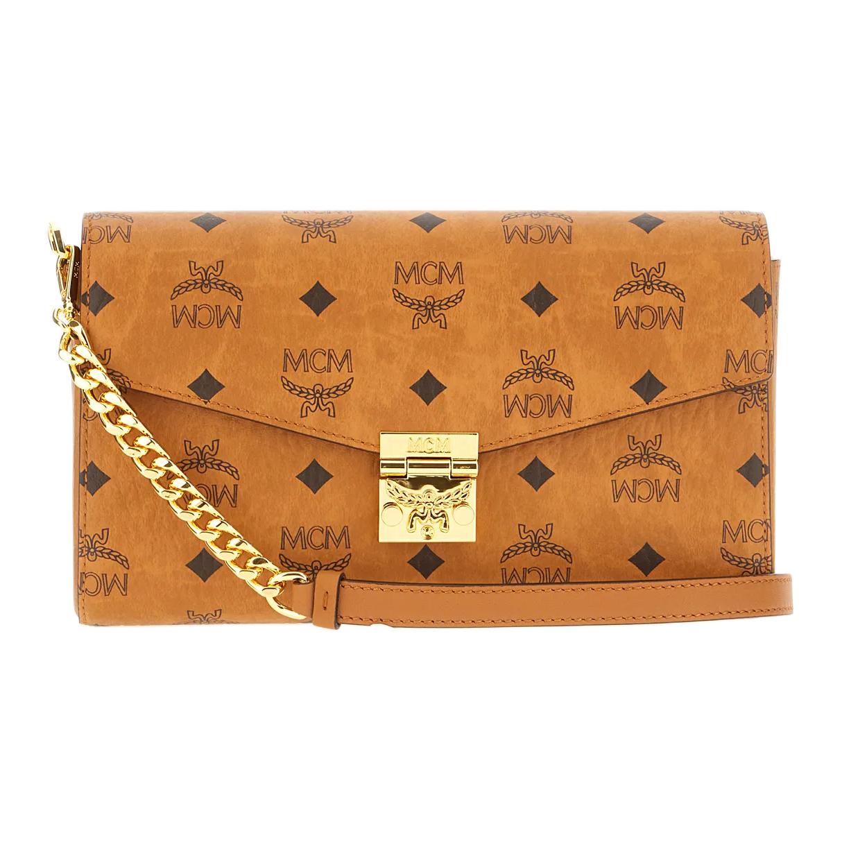 MCM Сумка через плечо Трейси среднего размера с откидным клапаном
MCM Сумка через плечо Трейси среднего размера с откидным клапаном