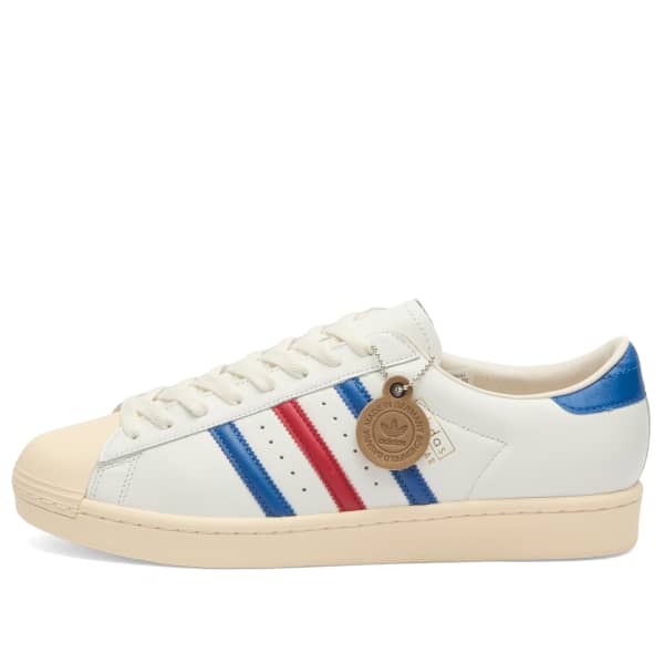 Винтажные кроссовки Superstar, сделанные в Германии Adidas, Core White, Blue & Better Scarlet
Винтажные кроссовки Superstar, сделанные в Германии Adidas, Core White, Blue & Better Scarlet