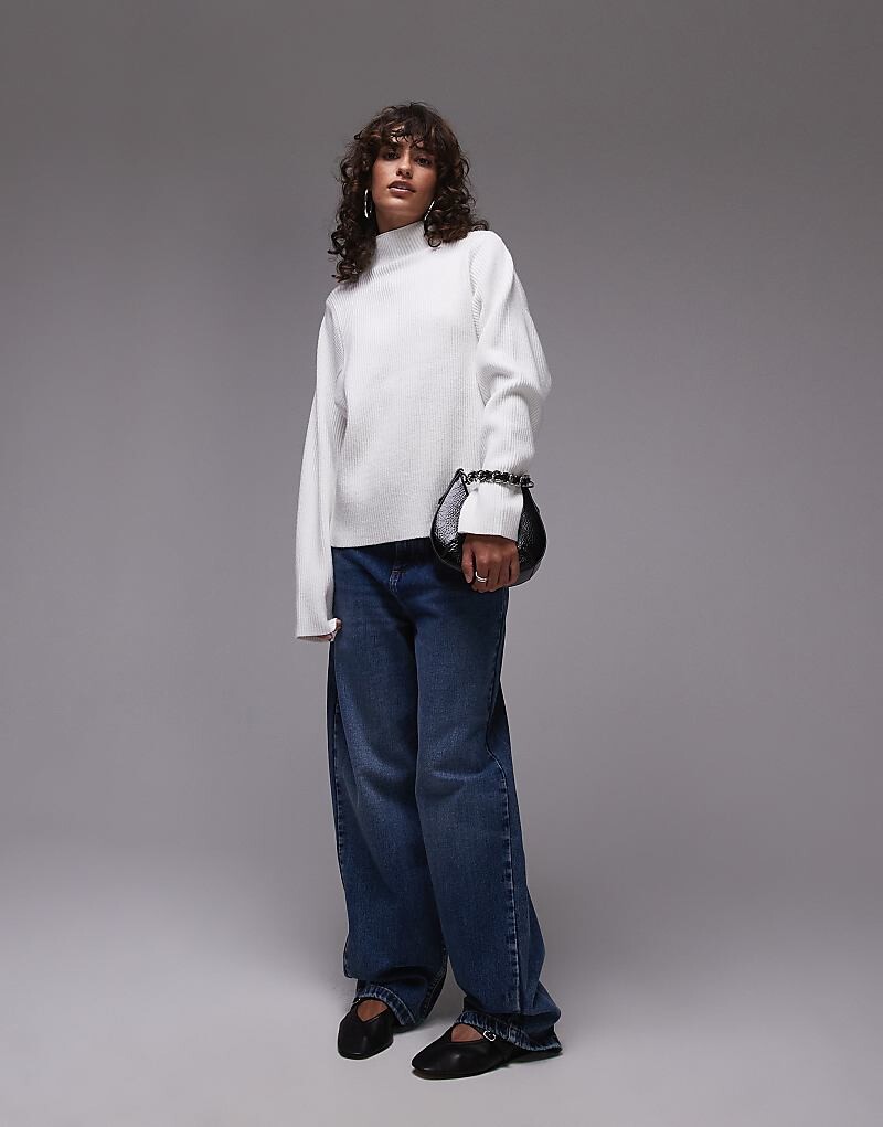 Кремовый свитер Topshop в рубчик с высоким воротником
Кремовый свитер Topshop в рубчик с высоким воротником