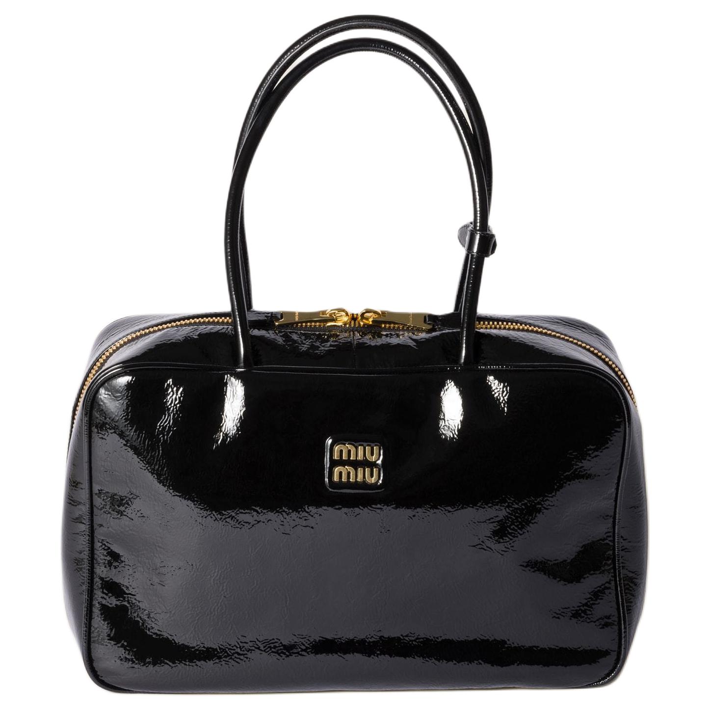 MIU MIU Женская сумка из овчины черная 
MIU MIU Женская сумка из овчины черная