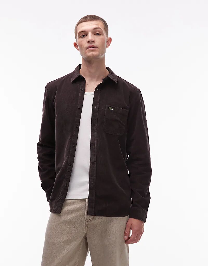 Коричневая рубашка с карманом Lacoste
Коричневая рубашка с карманом Lacoste