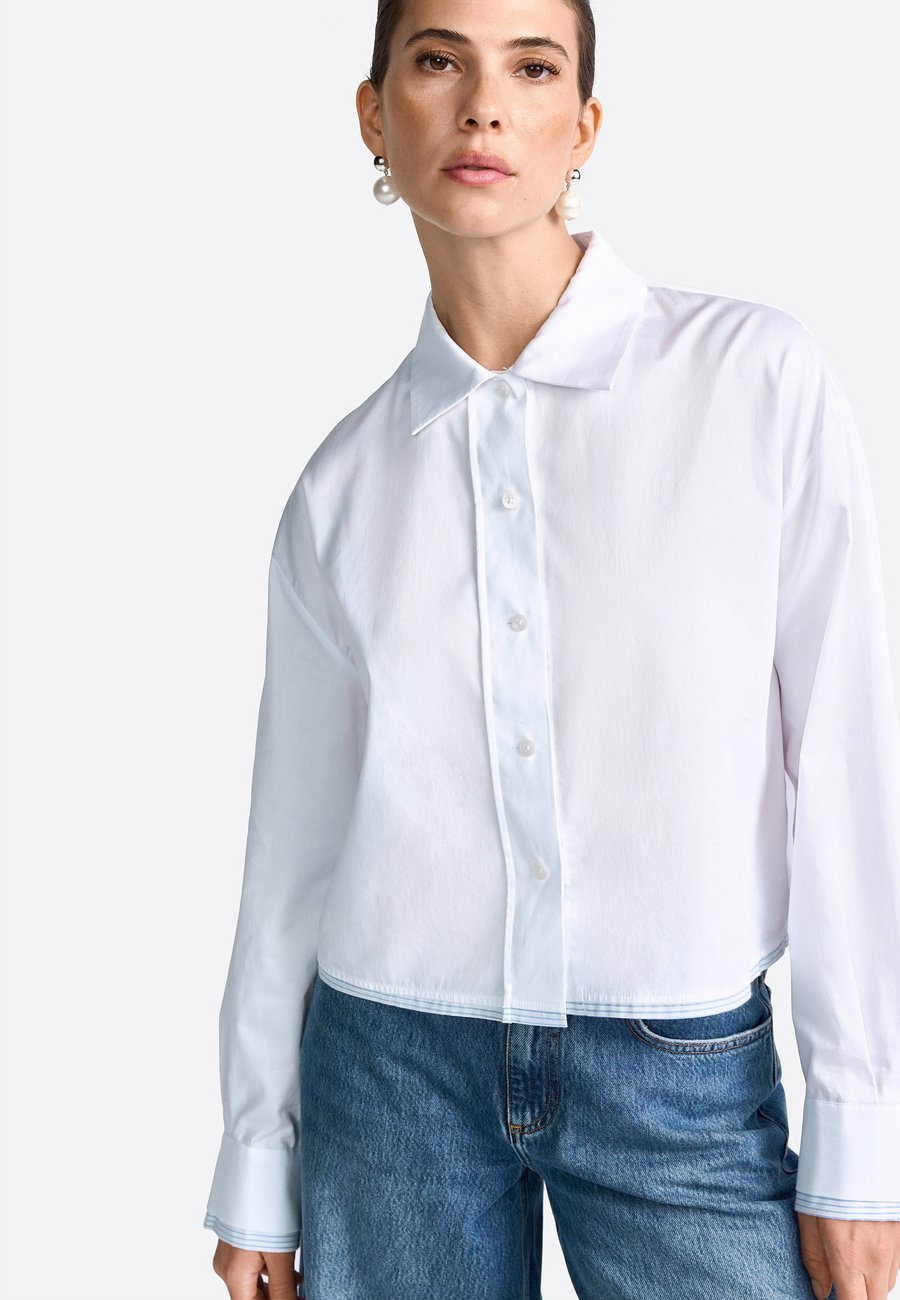 Блуза Rich & Royal Button-down blouse, White
Блуза Rich & Royal Button-down blouse, White