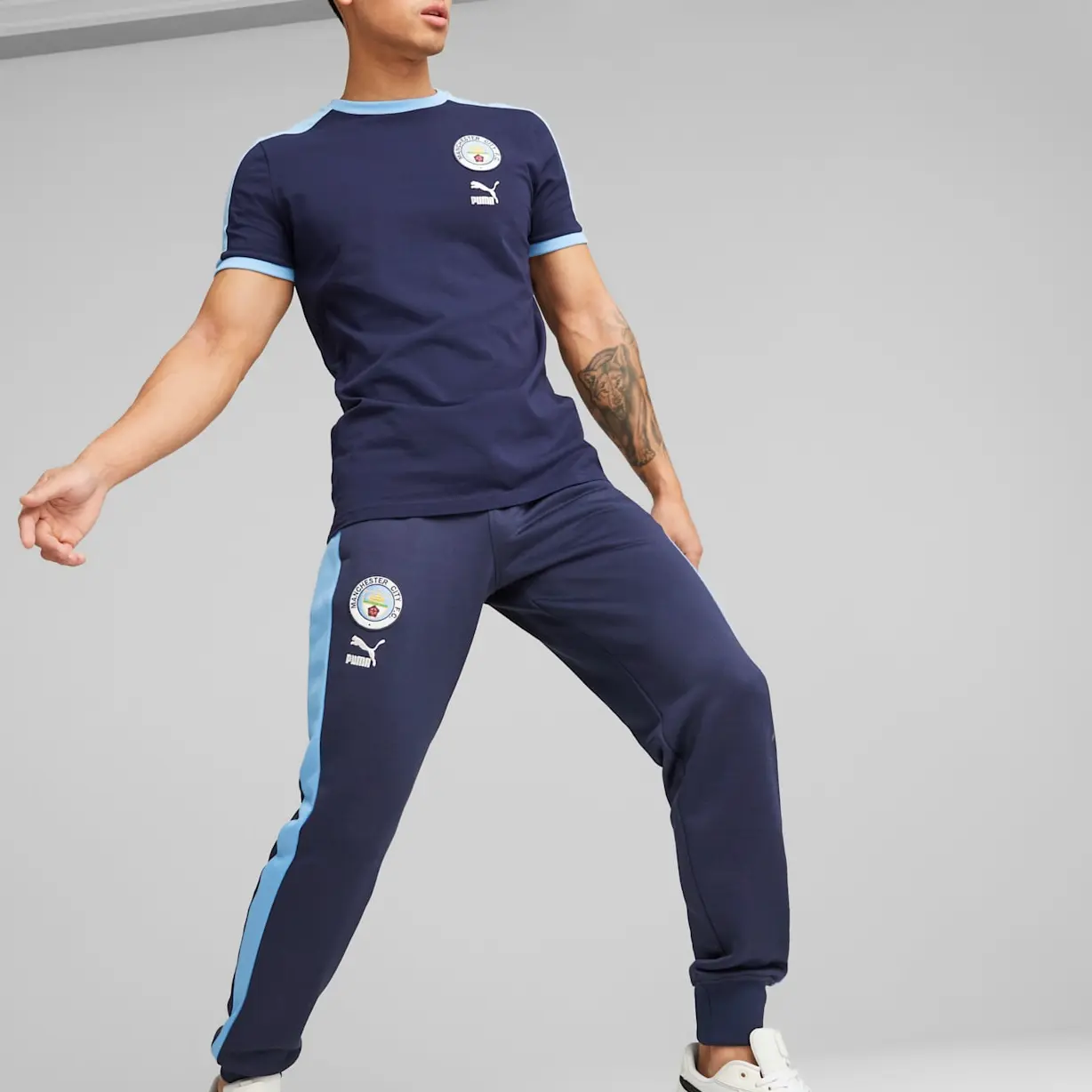 Трикотажные спортивные штаны футбольного клуба «Манчестер Сити» мужские синие Puma, синий
Трикотажные спортивные штаны футбольного клуба «Манчестер Сити» мужские синие Puma, синий