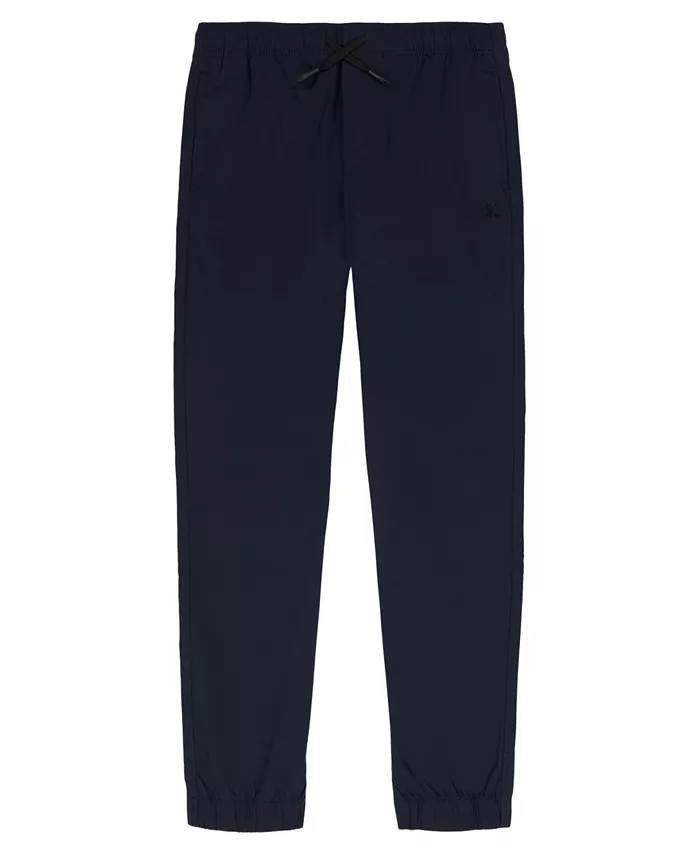 Комфортные эластичные брюки-джоггеры Calvin Klein Big Boys Calvin Klein, синий
Комфортные эластичные брюки-джоггеры Calvin Klein Big Boys Calvin Klein, синий