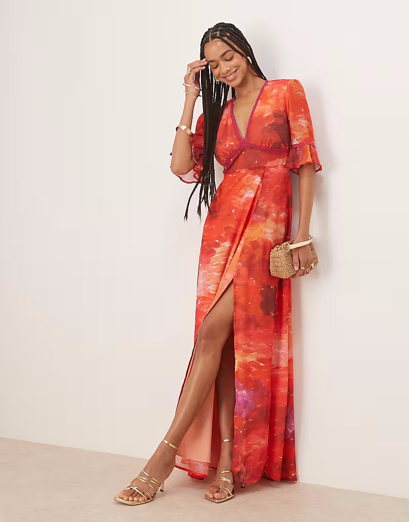 Платье макси с оборками на рукавах и разрезом на бедрах, с вырезом-замочной скважиной на спине, с оранжевым принтом Hope & Ivy
Платье макси с оборками на рукавах и разрезом на бедрах, с вырезом-замочной скважиной на спине, с оранжевым принтом Hope & Ivy
