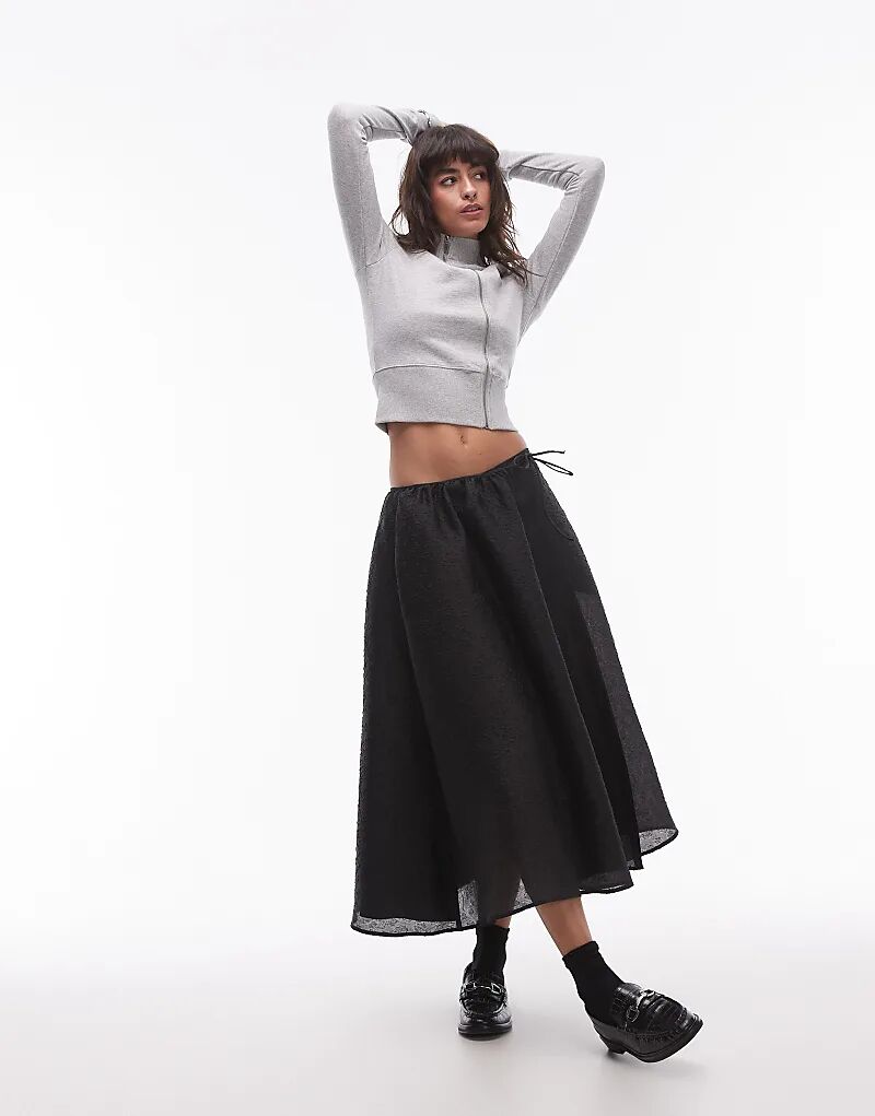 Юбка миди из парчи ARKET объемная черного цвета
Юбка миди из парчи ARKET объемная черного цвета