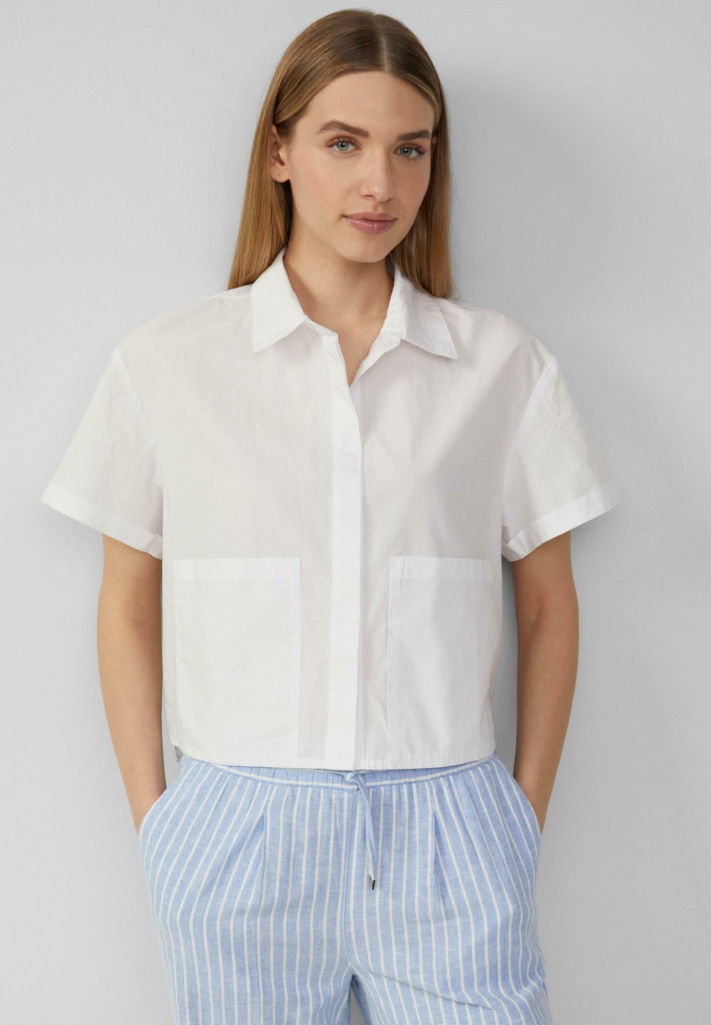 Блузка на пуговицах VERKÜRZTE IM MIT AUFGESETZTEN TASCHEN s.Oliver, белый
Блузка на пуговицах VERKÜRZTE IM MIT AUFGESETZTEN TASCHEN s.Oliver, белый