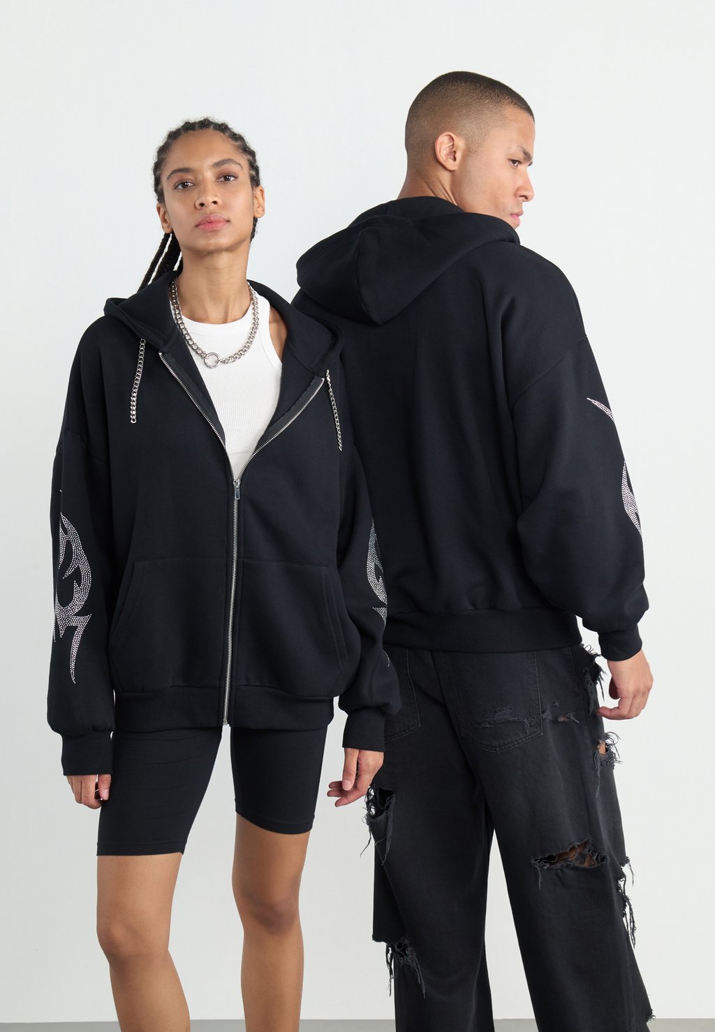 Толстовка на молнии RHINESTONE TRIBAL ZIP-UP UNISEX YOURTURN, черный 
Толстовка на молнии RHINESTONE TRIBAL ZIP-UP UNISEX YOURTURN, черный