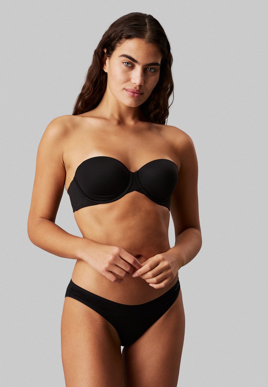 Бюстгальтер Calvin Klein Underwear LIGHTLY LINED STRAPLESS PERFECTLY FIT, Black
Бюстгальтер Calvin Klein Underwear LIGHTLY LINED STRAPLESS PERFECTLY FIT, Black