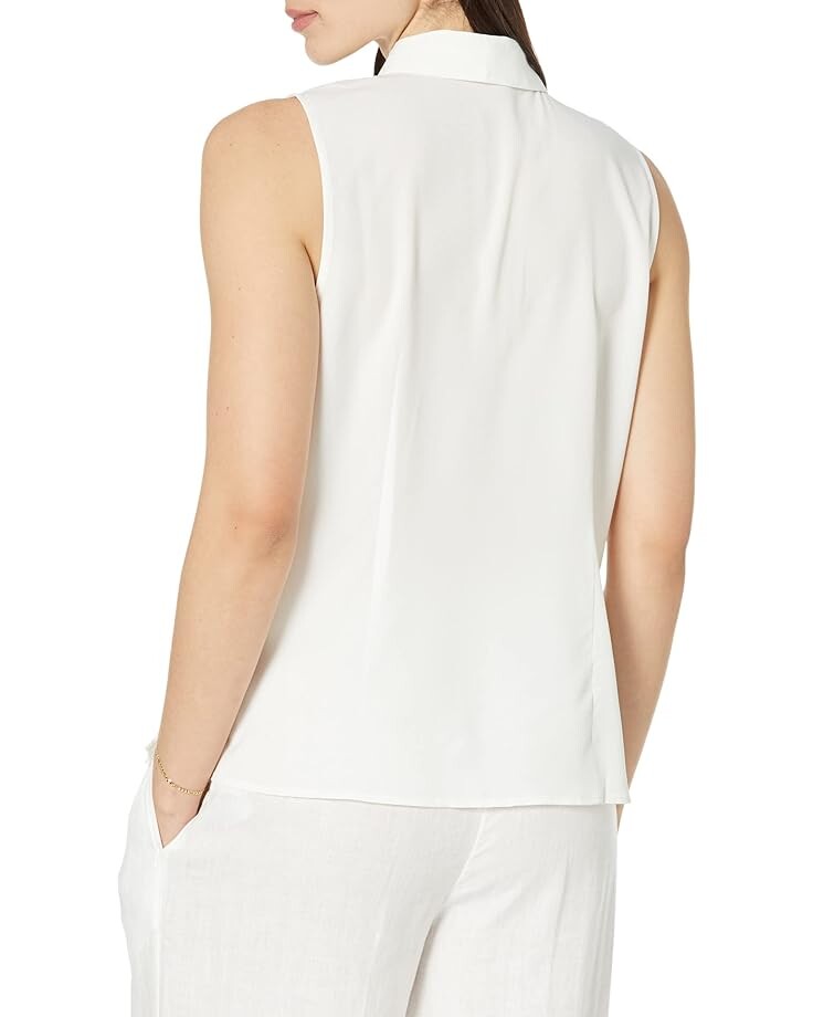 Блуза CeCe Sleeveless Bow Blouse, цвет New Ivory
Блуза CeCe Sleeveless Bow Blouse, цвет New Ivory