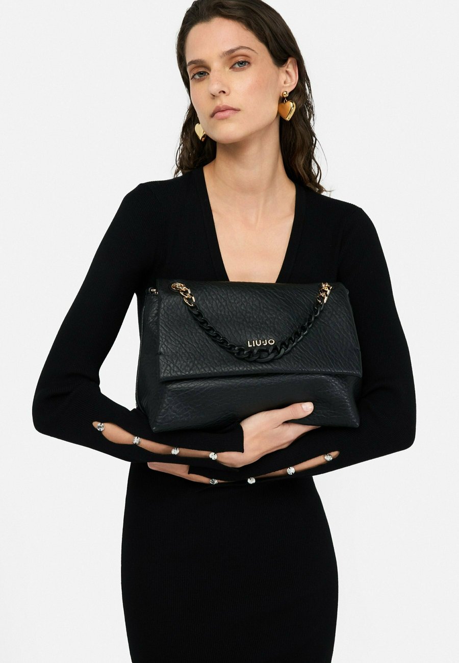 Сумка кросс-боди LIU JO Cross body bag, Black
Сумка кросс-боди LIU JO Cross body bag, Black