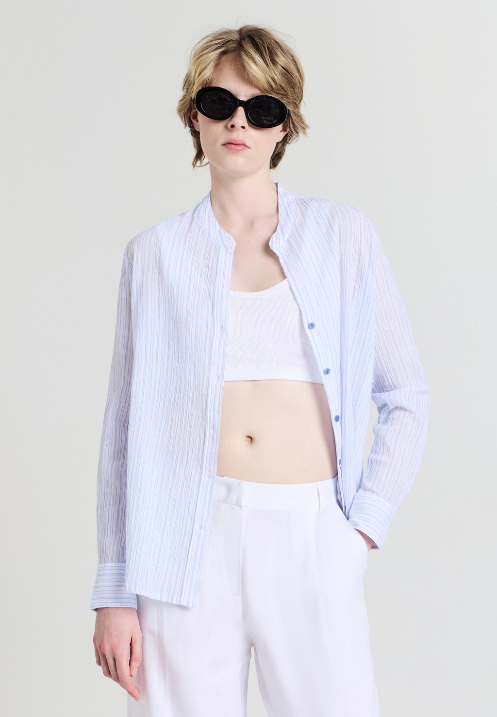 Блузка на пуговицах Calliope, светло-голубой
Блузка на пуговицах Calliope, светло-голубой