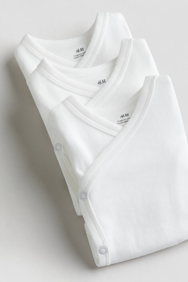 В упаковке 3 боди с запахом H&M, белый
В упаковке 3 боди с запахом H&M, белый