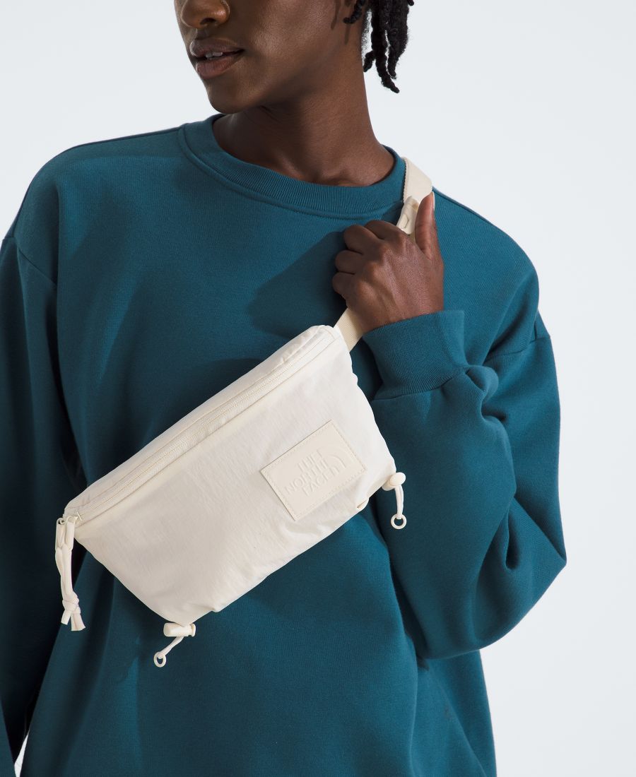 Женская поясная сумка Never Stop через плечо The North Face, White Dune
Женская поясная сумка Never Stop через плечо The North Face, White Dune