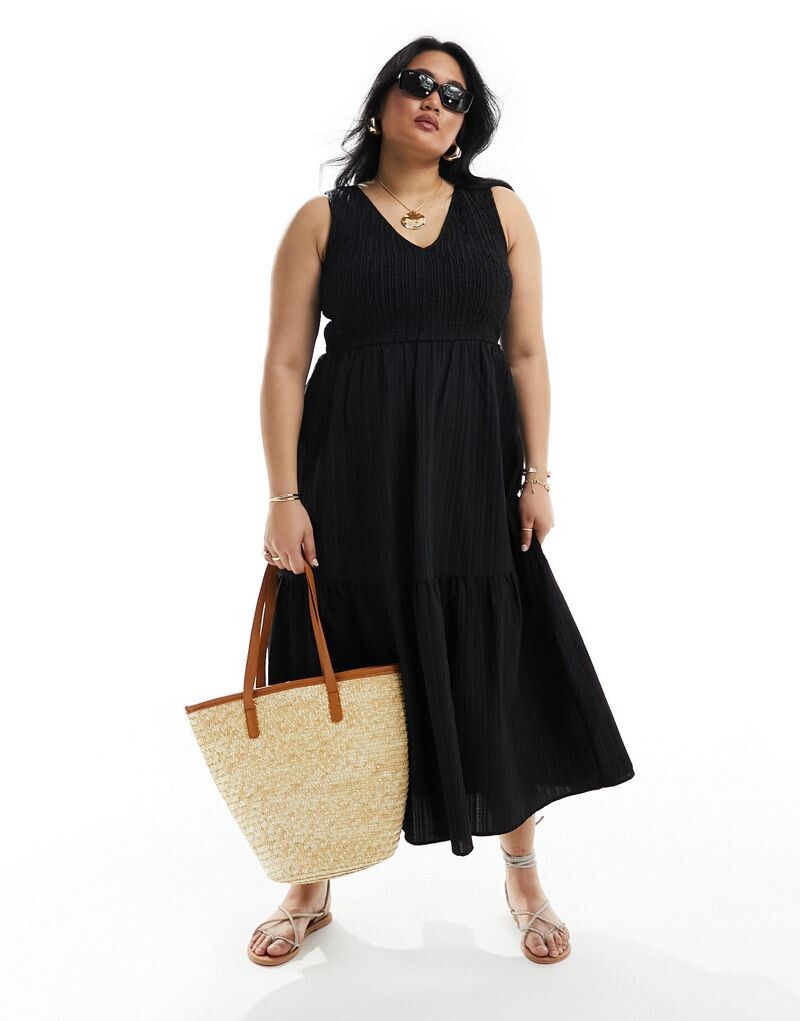 ASOS DESIGN Curve – летнее черное платье миди с глубоким вырезом и завязкой сзади
ASOS DESIGN Curve – летнее черное платье миди с глубоким вырезом и завязкой сзади