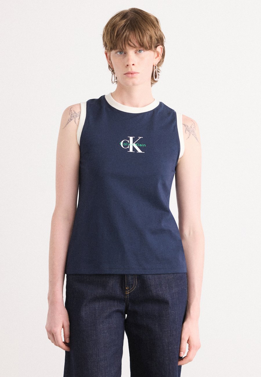 Топ Calvin Klein Jeans LOGO MUSCLE, Dark Sapphire/Dark Blue
Топ Calvin Klein Jeans LOGO MUSCLE, Dark Sapphire/Dark Blue
