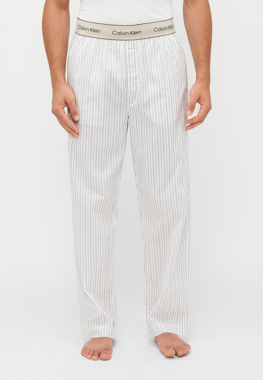 Пижамные брюки Calvin Klein Underwear Pyjama bottoms, Trail/Classic White/Multi-Coloured
Пижамные брюки Calvin Klein Underwear Pyjama bottoms, Trail/Classic White/Multi-Coloured