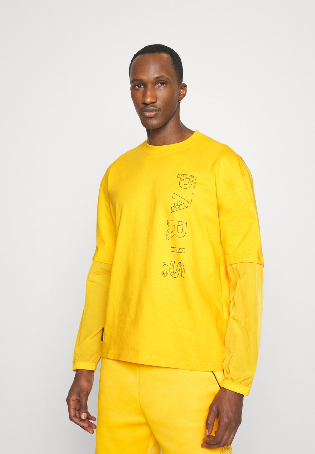 Лонгслив JORDAN PARIS ST GERMAIN - Club wear Nike Performance, желтый 
Лонгслив JORDAN PARIS ST GERMAIN - Club wear Nike Performance, желтый