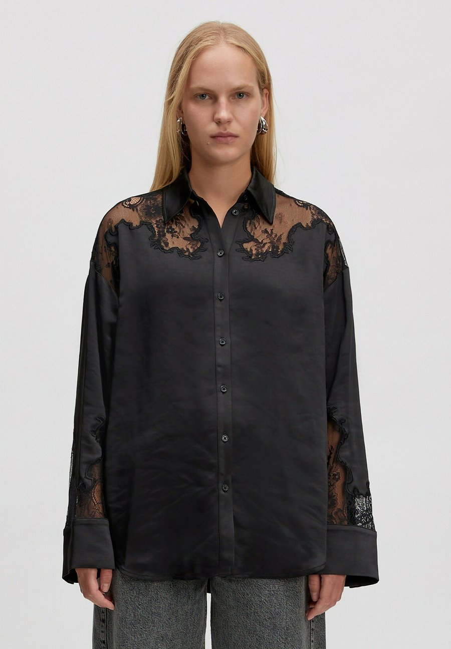 Блуза EDITED ELROY, Schwarz/Black
Блуза EDITED ELROY, Schwarz/Black