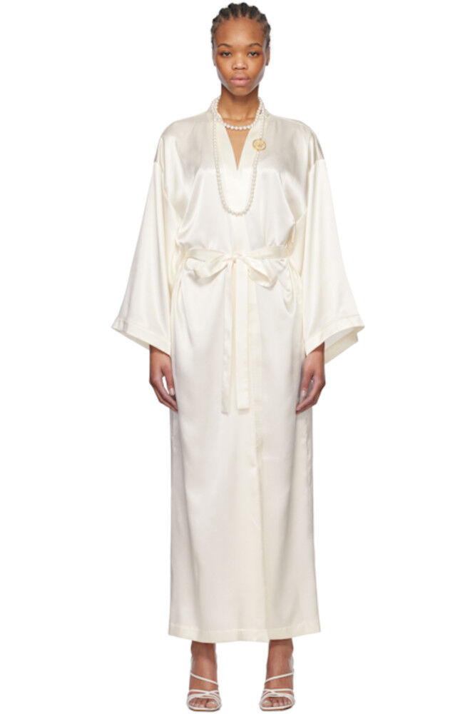 Халат с логотипом из белого страза Blumarine
Халат с логотипом из белого страза Blumarine