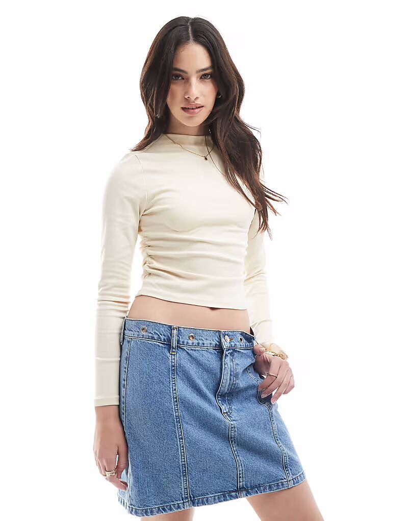 Джинсовая юбка ASOS DESIGN со средней посадкой и люверсами на поясе
Джинсовая юбка ASOS DESIGN со средней посадкой и люверсами на поясе