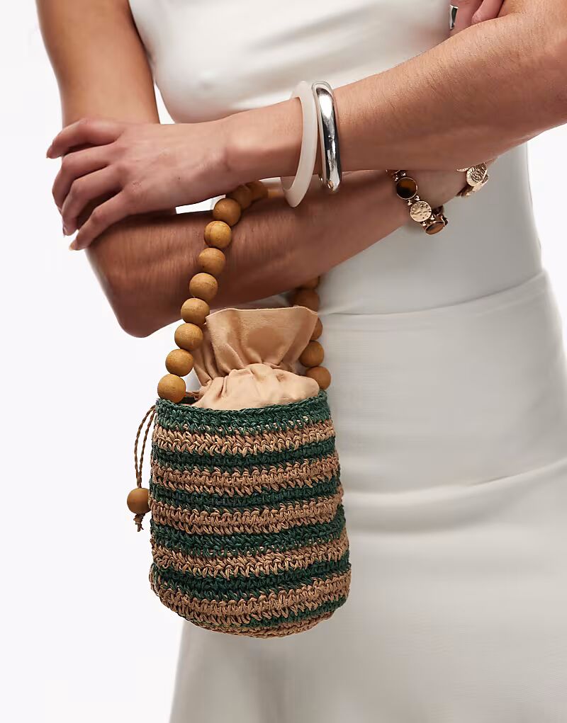 Соломенная сумка Topshop Gevvie с ручкой из бисера в зеленую полоску
Соломенная сумка Topshop Gevvie с ручкой из бисера в зеленую полоску