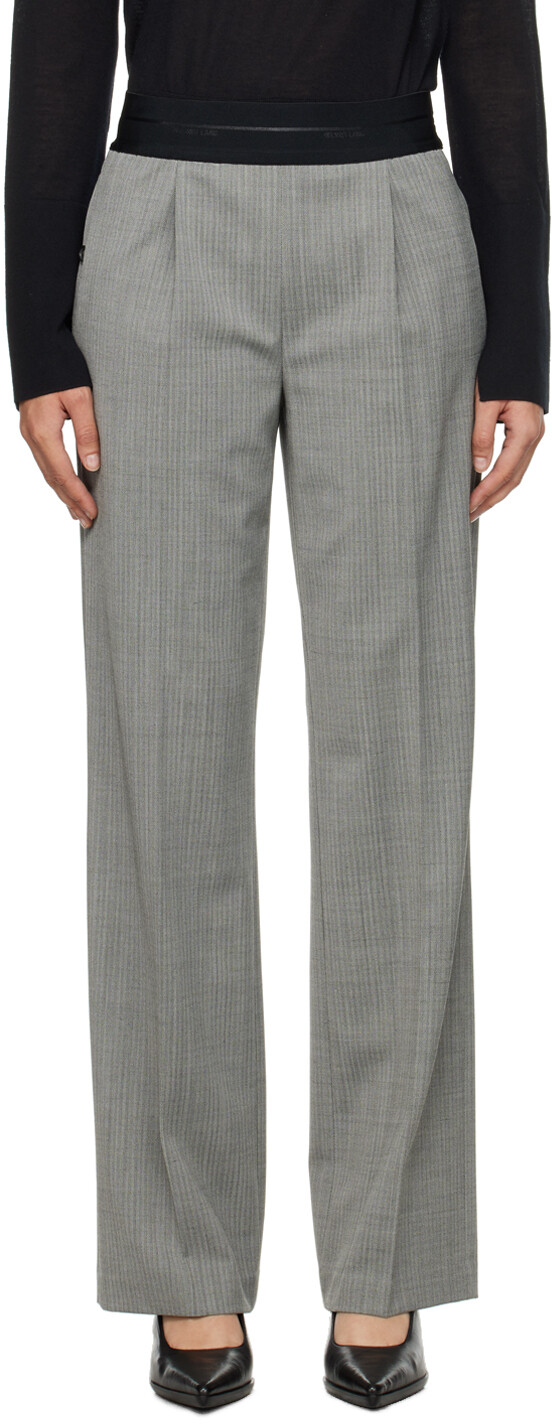 Черно-белые брюки без застежки Helmut Lang
Черно-белые брюки без застежки Helmut Lang