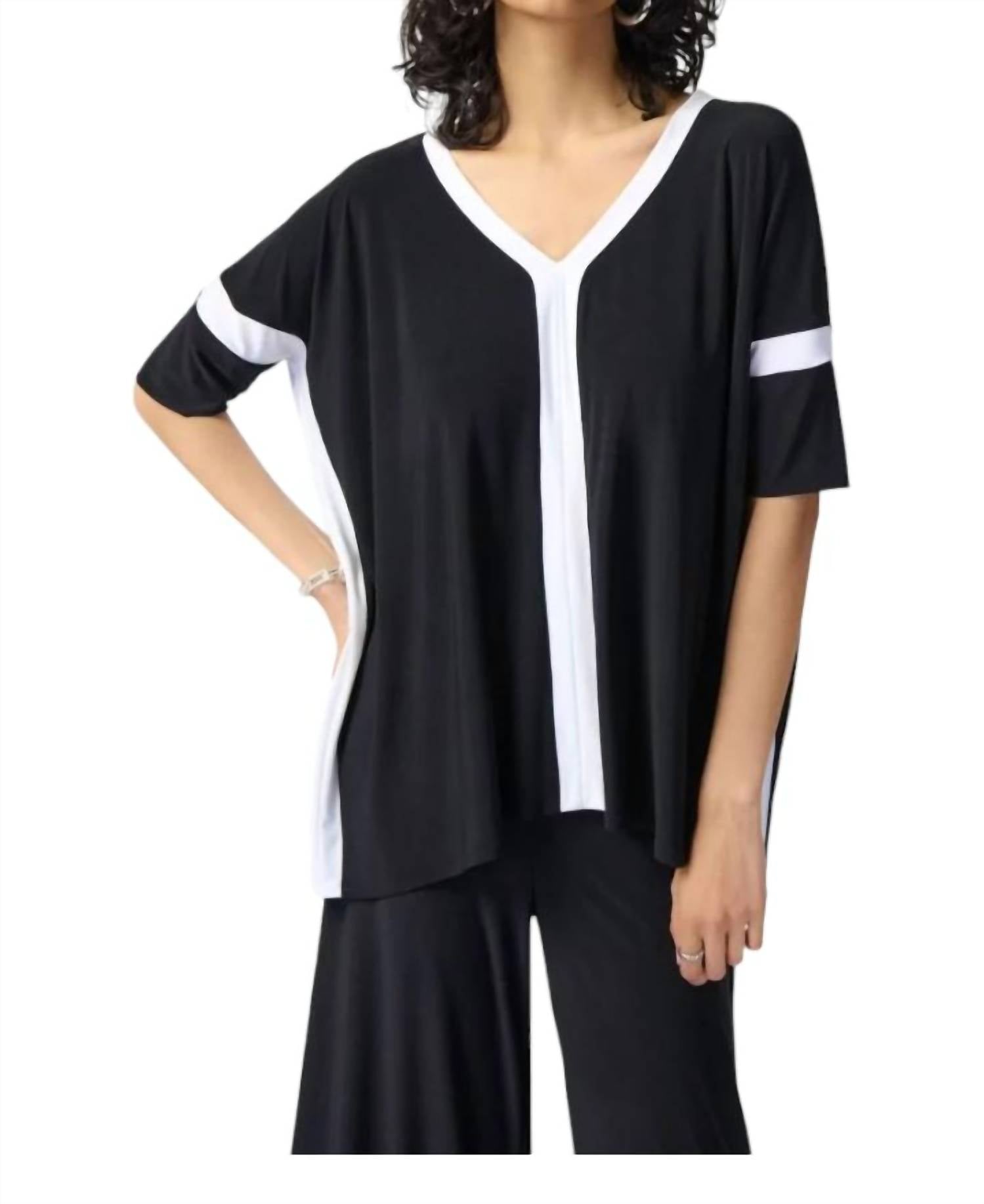 Шелковистый трикотажный топ с цветными блоками черного/ванильного цвета Joseph Ribkoff
Шелковистый трикотажный топ с цветными блоками черного/ванильного цвета Joseph Ribkoff