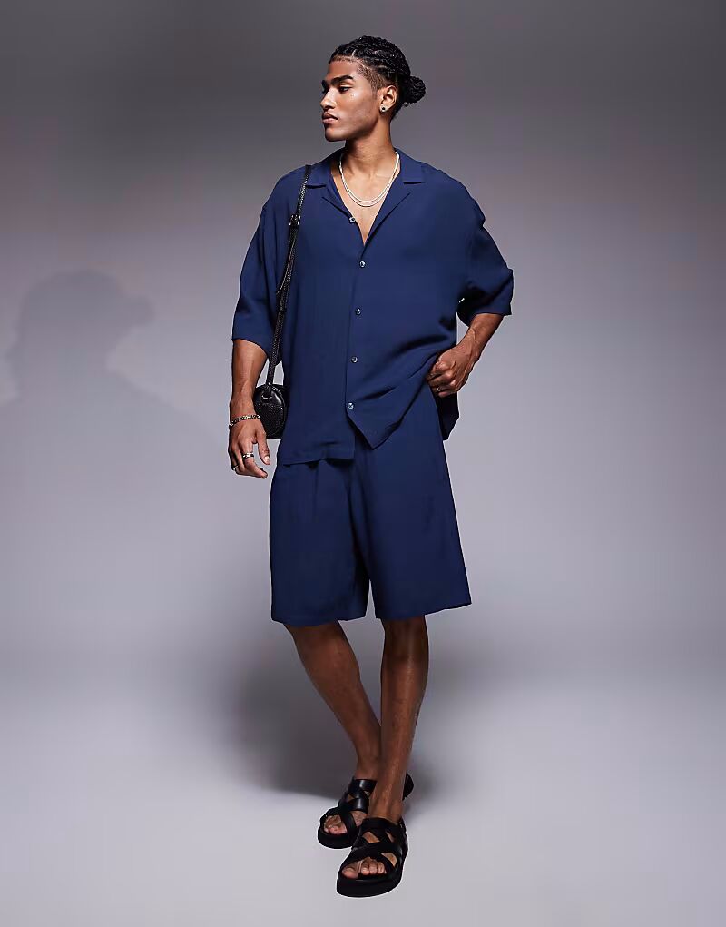 Длинные шорты темно-синего цвета Asos Design
Длинные шорты темно-синего цвета Asos Design