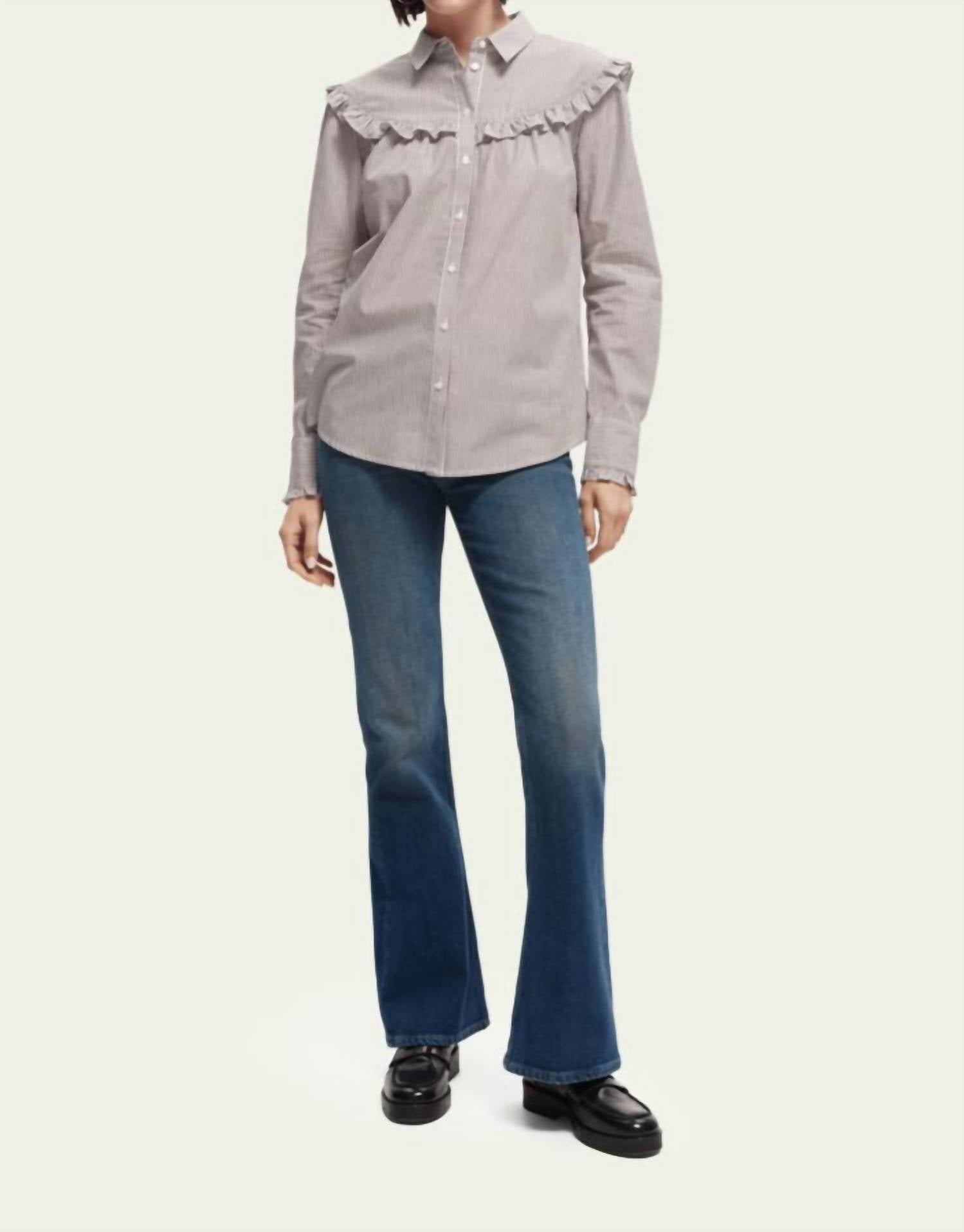 Джинсы Charm Flared из органического хлопка синего цвета SCOTCH & SODA
Джинсы Charm Flared из органического хлопка синего цвета SCOTCH & SODA