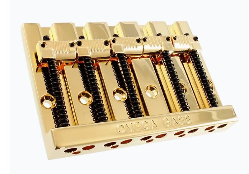Gold OMEGA Grooved Badass V Style 5-струнный бридж для бас-гитары BB-3361-002 Allparts
Gold OMEGA Grooved Badass V Style 5-струнный бридж для бас-гитары BB-3361-002 Allparts