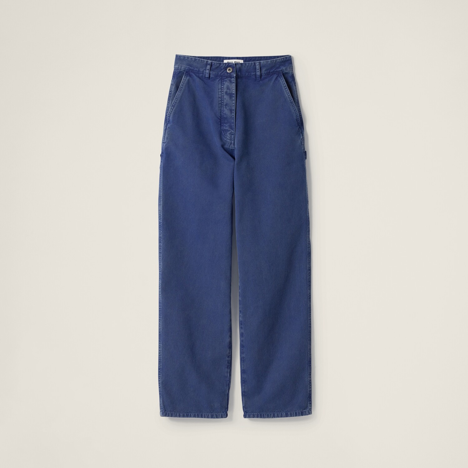 Окрашенные после пошива габардиновые брюки MIU MIU, индиго синий
Окрашенные после пошива габардиновые брюки MIU MIU, индиго синий