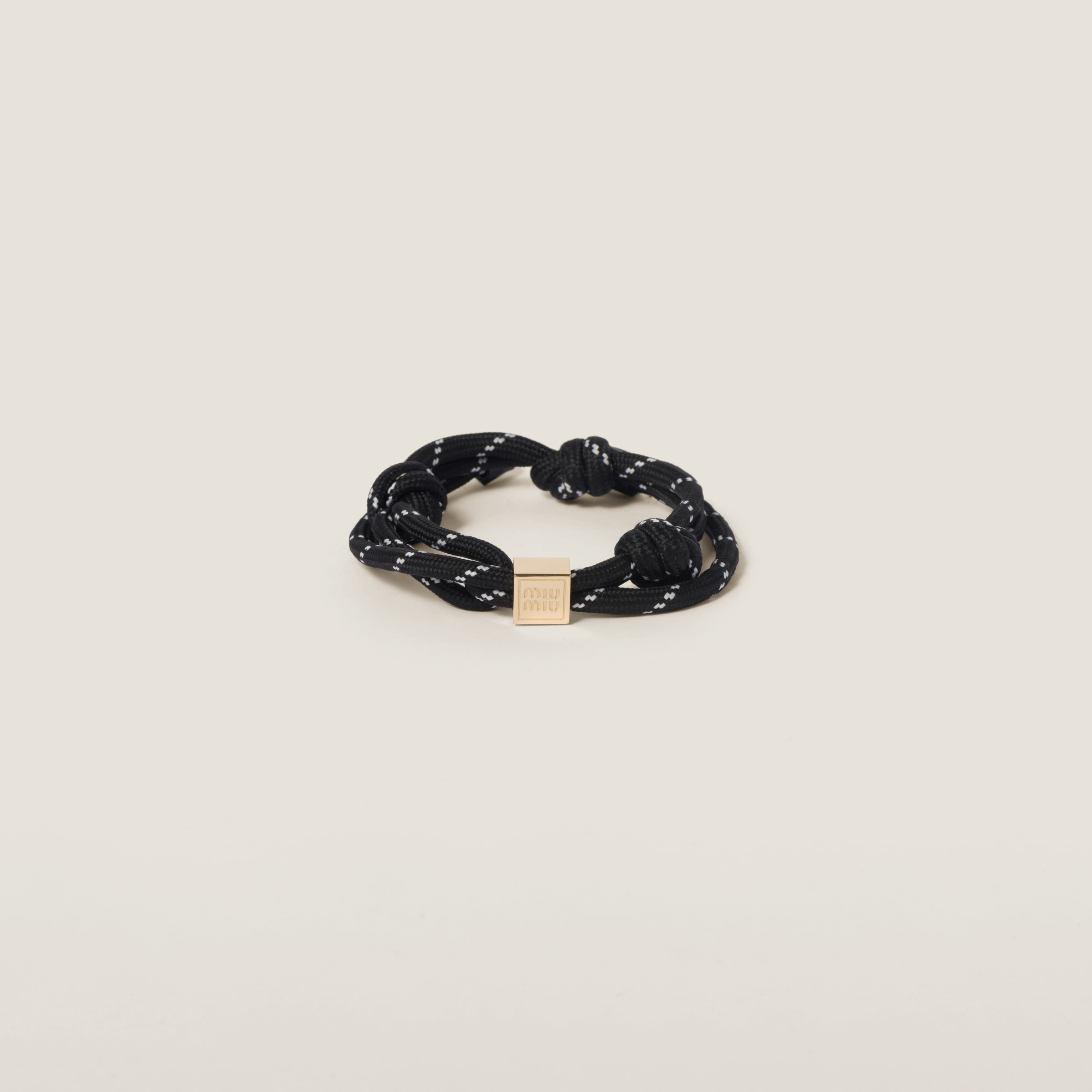 Шнурковый браслет MIU MIU, черный
Шнурковый браслет MIU MIU, черный