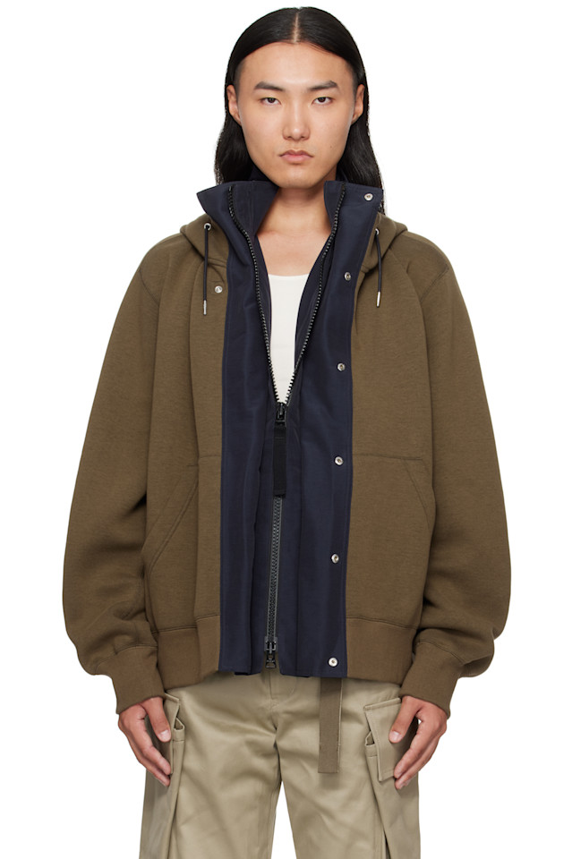 Sacai Толстовка из вспененного материала цвета хаки и темно-синего цвета с капюшоном из репсовой ленты
Sacai Толстовка из вспененного материала цвета хаки и темно-синего цвета с капюшоном из репсовой ленты