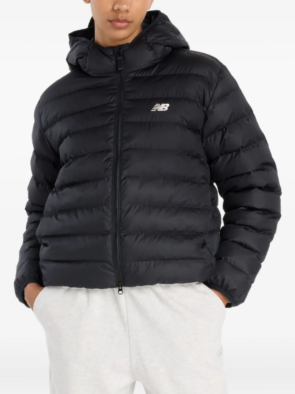 Пуховик Sport Essentials с капюшоном New Balance, черный
Пуховик Sport Essentials с капюшоном New Balance, черный