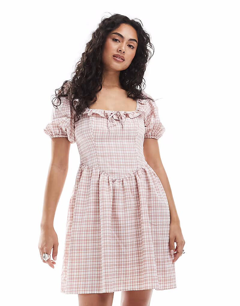 Мини-платье New Look с корсетной отделкой в клетку розового цвета
Мини-платье New Look с корсетной отделкой в клетку розового цвета