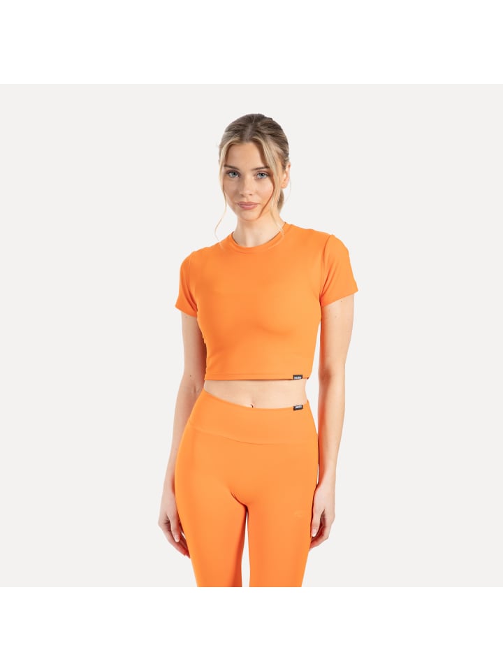 Укороченная рубашка Kenna оранжевого цвета SMILODOX
Укороченная рубашка Kenna оранжевого цвета SMILODOX