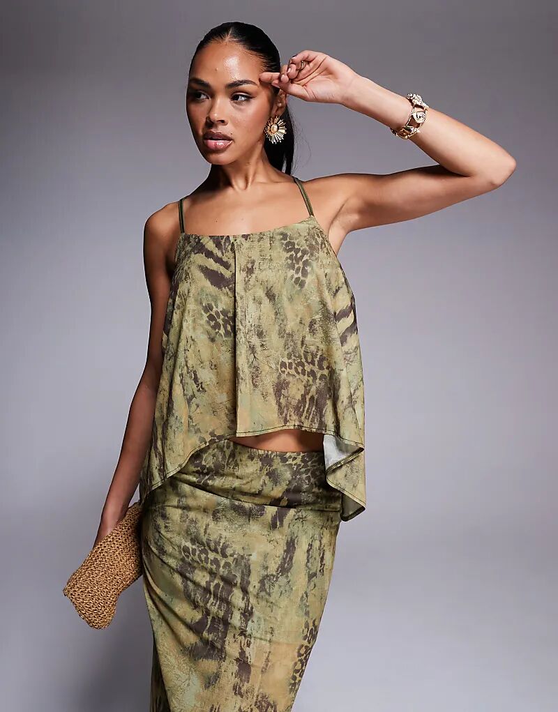 Топ из сетчатой ткани с завязками сзади и зеленым анималистичным принтом от ASOS DESIGN
Топ из сетчатой ткани с завязками сзади и зеленым анималистичным принтом от ASOS DESIGN