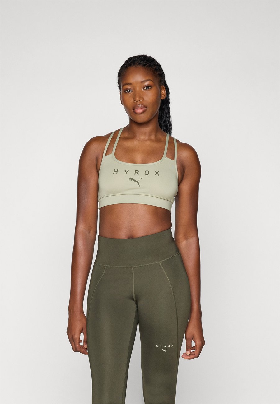 Бюстгальтер Puma HYROX MOVE STRAPPY BRA, Lux Army/Beige
Бюстгальтер Puma HYROX MOVE STRAPPY BRA, Lux Army/Beige