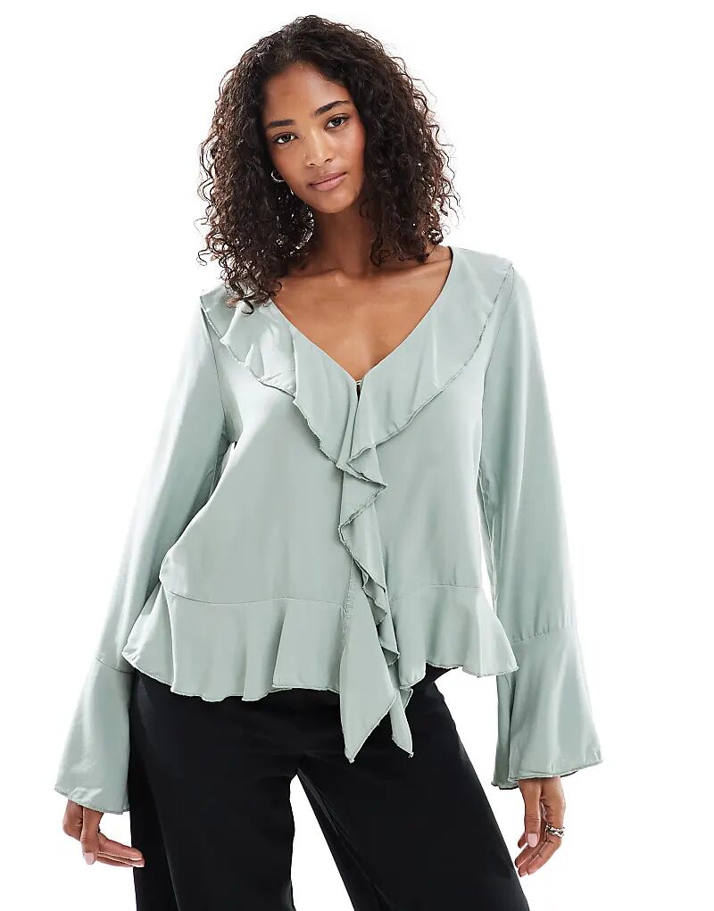 Блузка в стиле бохо Vero Moda с оборками и рукавами-колокольчиками нежно-зеленого цвета
Блузка в стиле бохо Vero Moda с оборками и рукавами-колокольчиками нежно-зеленого цвета