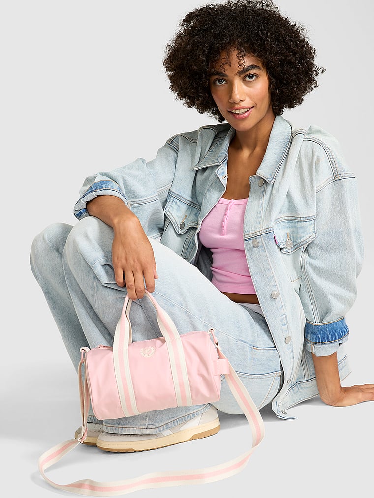 Мини-Нейлоновая дорожная сумка Pink, цвет dollhouse
Мини-Нейлоновая дорожная сумка Pink, цвет dollhouse