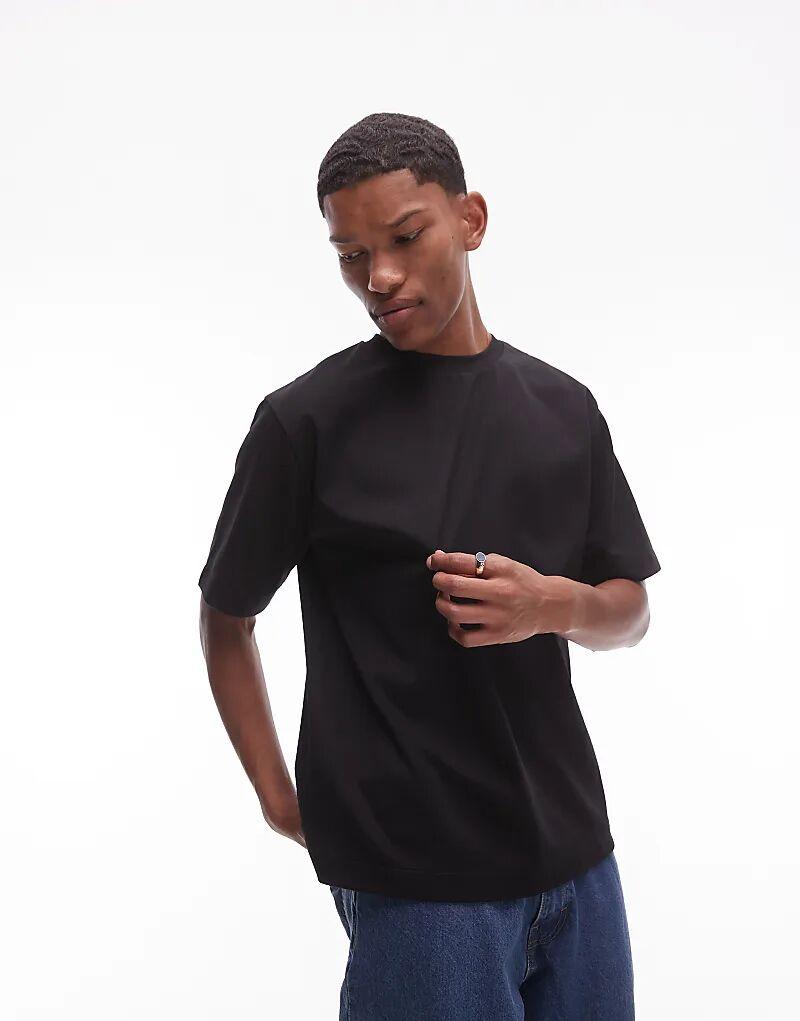 Футболка ARKET из плотного интерлок-джерси свободного кроя черного цвета
Футболка ARKET из плотного интерлок-джерси свободного кроя черного цвета