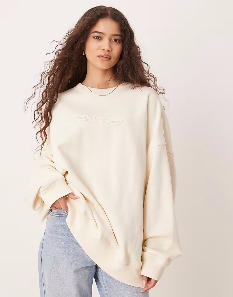 Толстовка Adidas Originals Essentials linear oversize Crew в кремово-белом цвете
Толстовка Adidas Originals Essentials linear oversize Crew в кремово-белом цвете