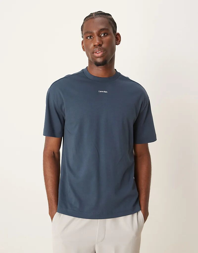 Футболка с нано-логотипом синего цвета Calvin Klein 
Футболка с нано-логотипом синего цвета Calvin Klein