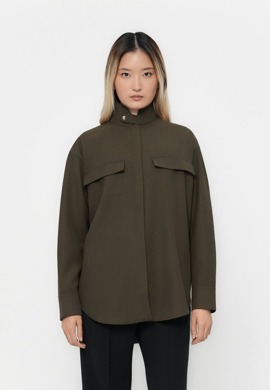 Блуза Copenhagen Studios OVERSHIRT, Olive
Блуза Copenhagen Studios OVERSHIRT, Olive