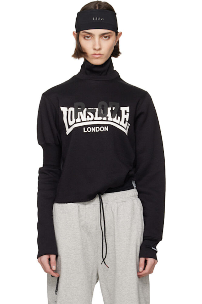 Черная водолазка с нарукавной повязкой Prototypes
Черная водолазка с нарукавной повязкой Prototypes