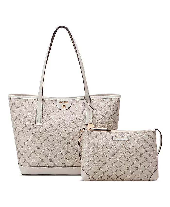 Теган 2 в 1 Сумка-тоут Nine West, коричневый/бежевый
Теган 2 в 1 Сумка-тоут Nine West, коричневый/бежевый