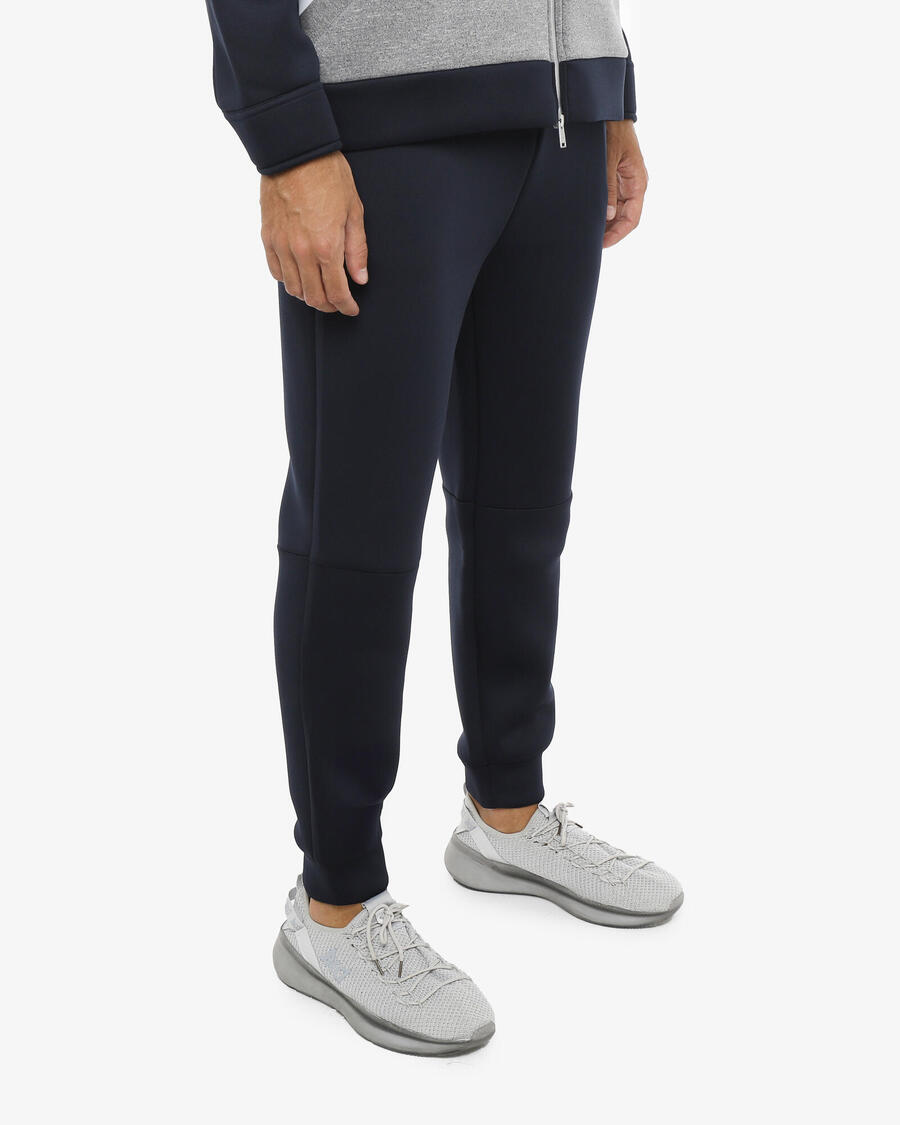 JAKED Синтетические спортивные брюки темно-синего цвета для мужчин
JAKED Синтетические спортивные брюки темно-синего цвета для мужчин