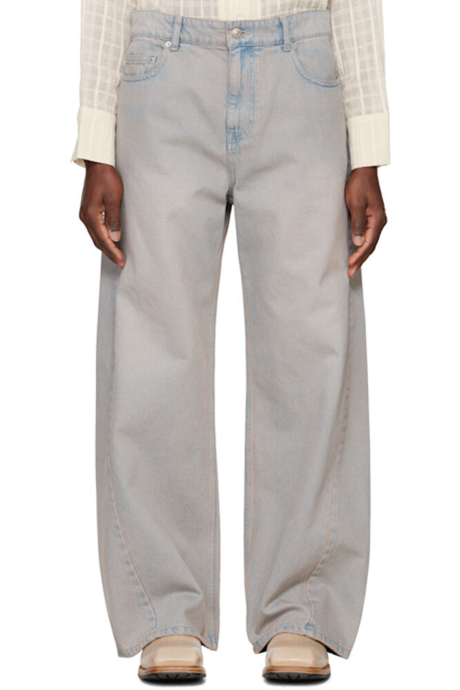 Бежевые джинсы с перекрученным боковым швом System
Бежевые джинсы с перекрученным боковым швом System